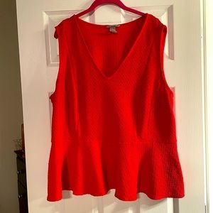 H&M plus size red shirt. Very light material and very flattering.